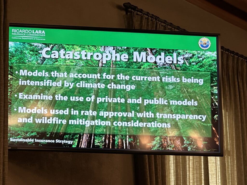 A presentation slide titled "Catastrophe Models" with bullet points "Models that account for the current risks being intensified by climate change; examine the use of private and public models; models used in rate approval with transparency and wildfire mitigation considerations"